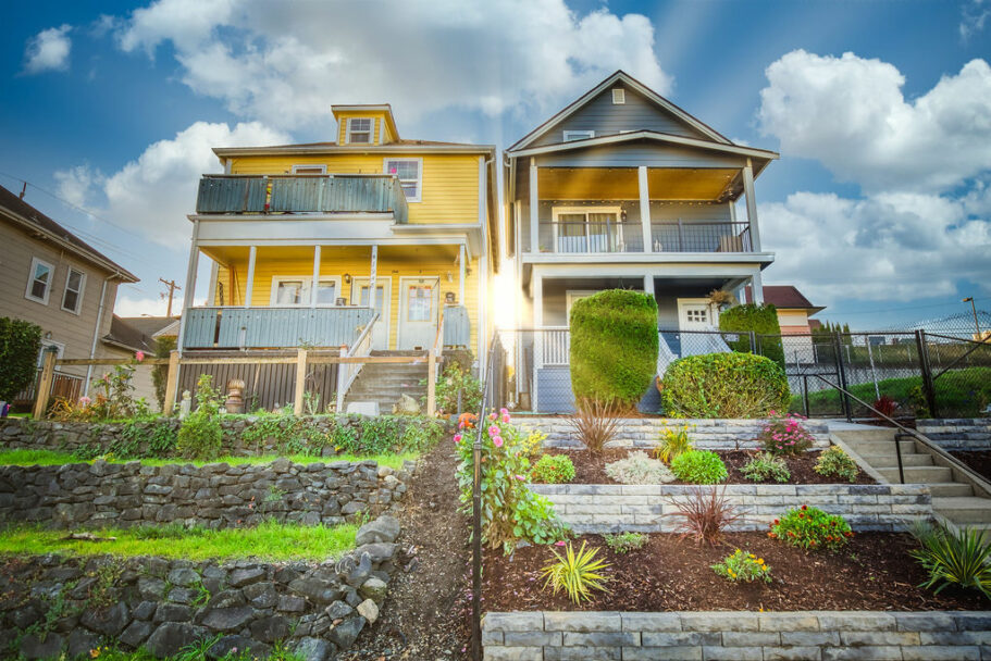 Sun shining between two historic homes in Tacoma WA
