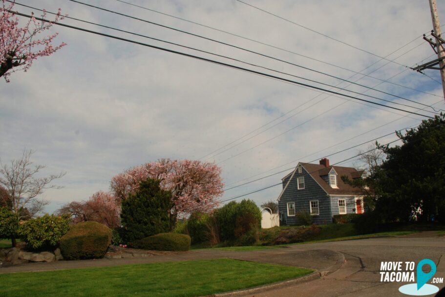 Blue house with red door in North Tacoma WA.
