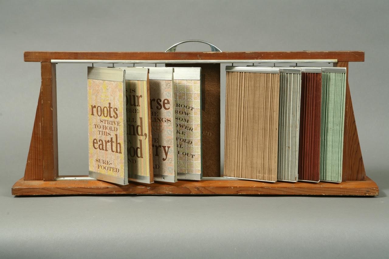 The Greater Tacoma Community Foundation of Art Award recognizes the essential role art plays in our community and to honor professional artists in the region. The winning artist receives an award to create a commissioned art piece representing their interpretation of the Pierce County community. "Ingrained" was commissioned for the 2011 Foundation of Art award, and compares the strength of community to a forest of trees. Original text was handset with ornaments, metal and wood type then letterpress printed on handmade Western red cedar and abaca paper. The prints were bound into a vintage cedar shake sales display found on Tacoma’s antique row.