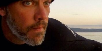 dean burke paddling on commencement bay