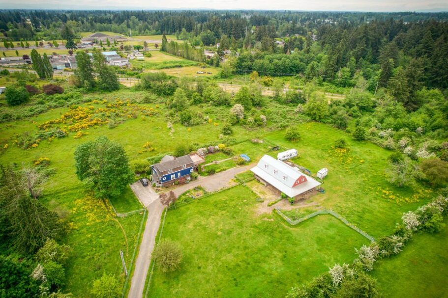 home on land with trees and a barn in the waller neighborhood of tacoma