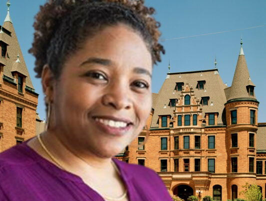 a photo of tanisha jumper from tacoma public schools in a purple shirt over a background of stadium high school in tacoma washington